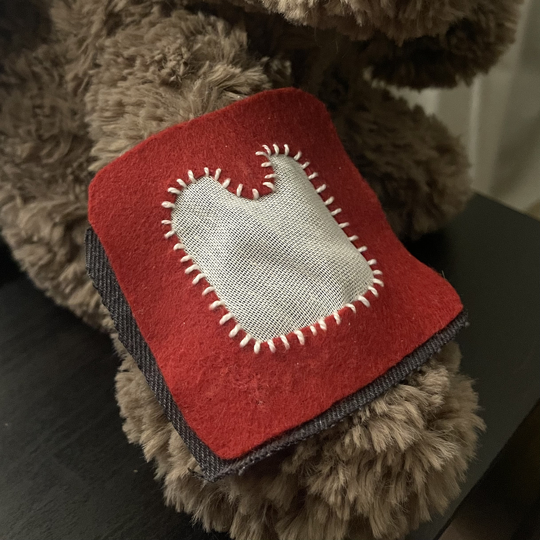 This is the arm test fit. I was worried that the patch was too big for Miffy. But then I remembered that the sensor itself is long and needs the room. It still does look big though.